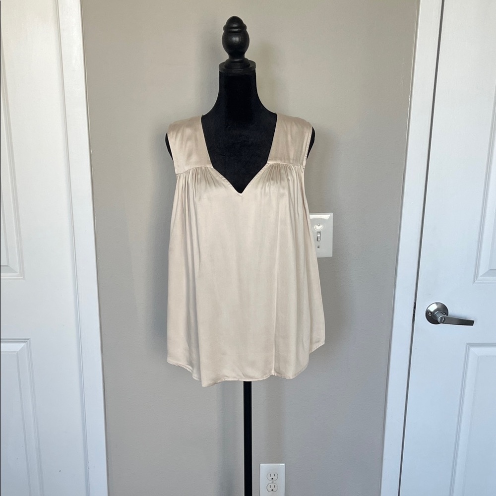 Nomad Elegant Cream Sleeveless Blouse